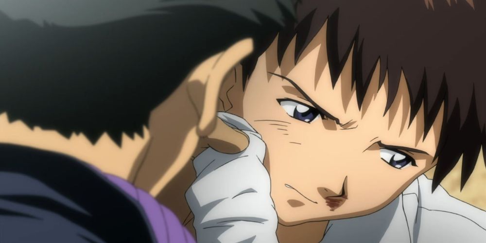 Evangelion Toji Holds Shinji by His Collar, While an Injured Shinji Looks Down