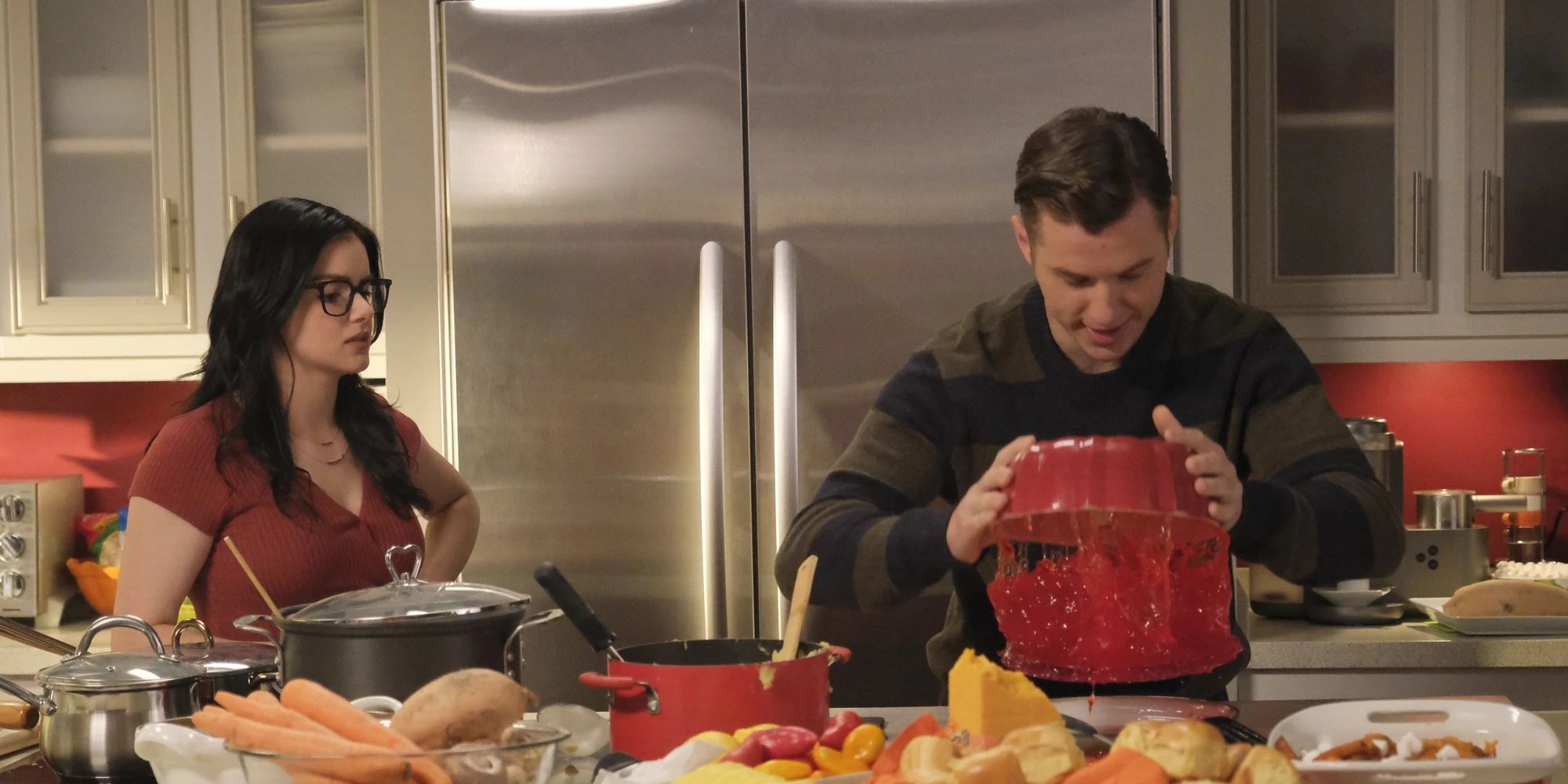 Alex and Luke helping with the kitchen in Modern Family
