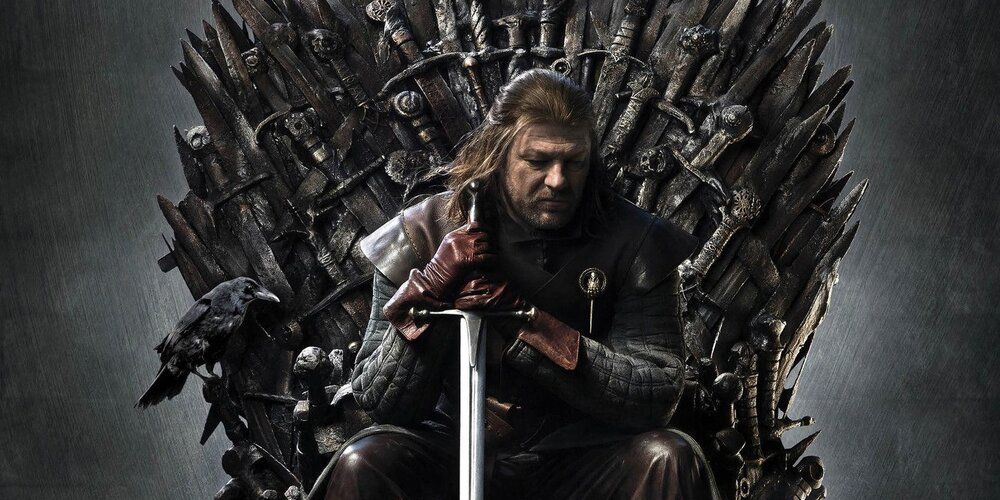 Ned Stark sitting on the Iron Throne in a promotional image Game of Thrones