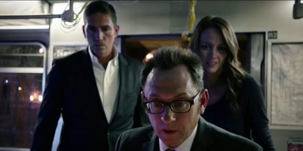 Three people looking down in Person Of Interest 