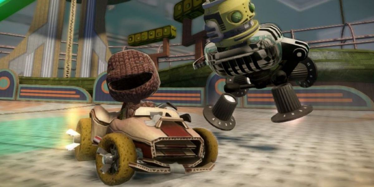A Sack Person smiles while racing in LittleBigPlanet Karting.