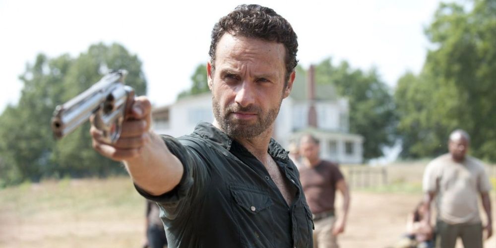 Rick Grimes pointing his revolver in The Walking Dead