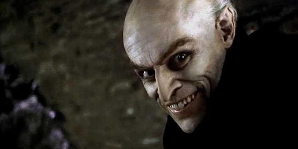 Willem Dafoe grins as Max Schreck in Shadow Of The Vampire
