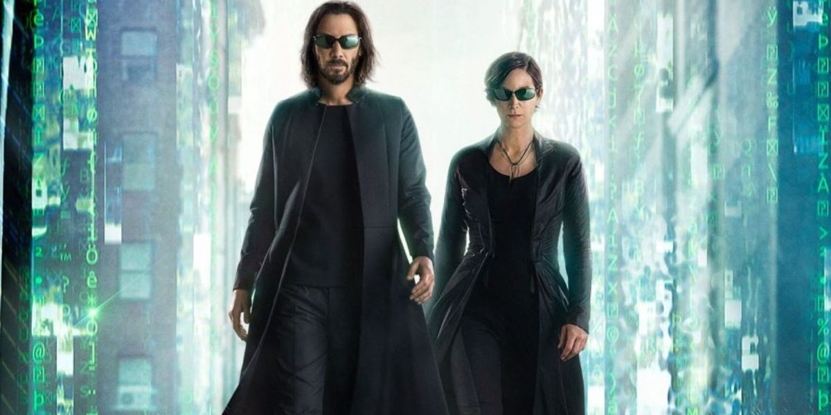 Keanu Reeves as Neo and Carrie-Anne Moss as Trinity in Matrix Resurrections