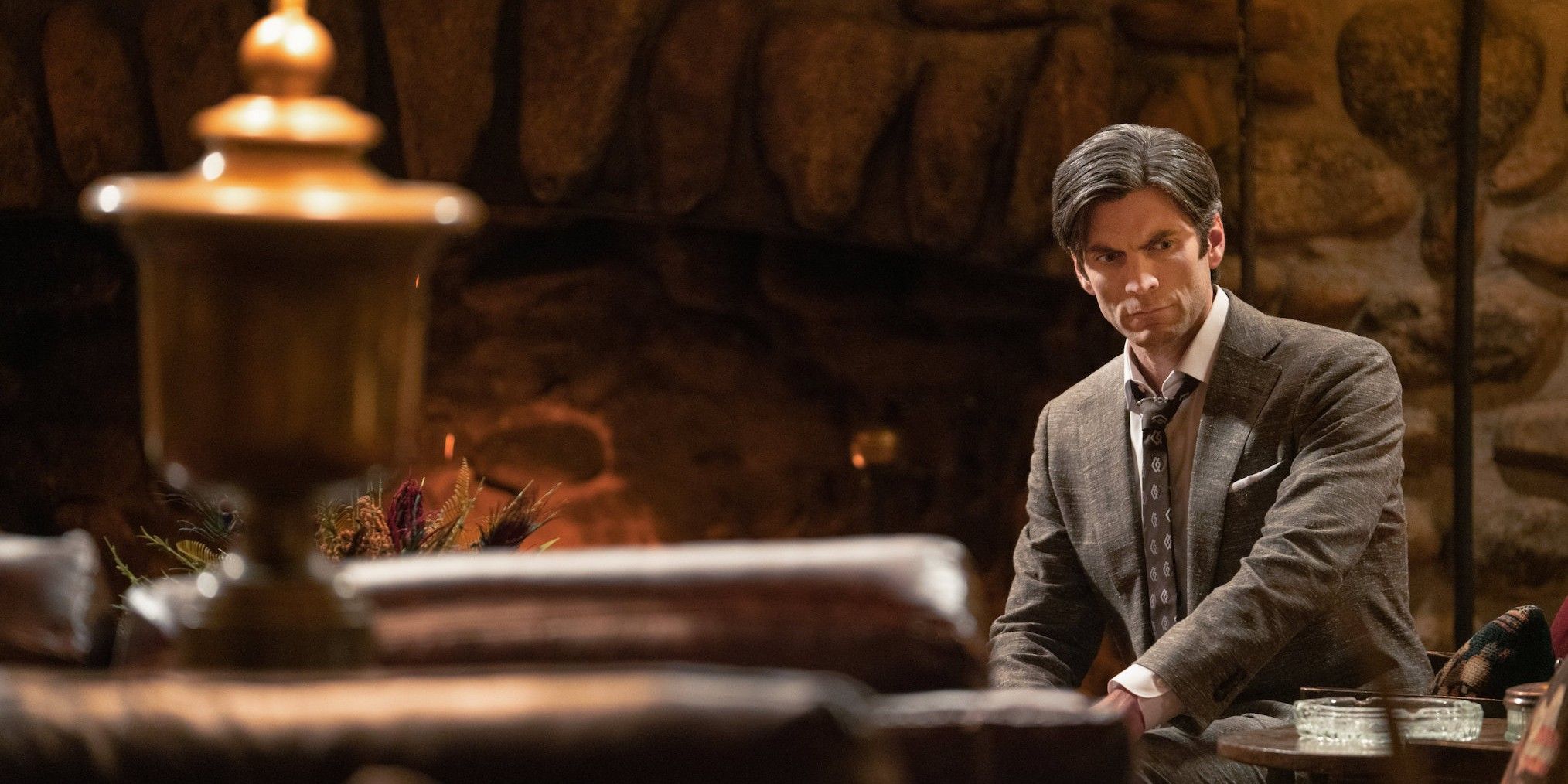 Yellowstone's Jamie Dutton (played by Wes Bentley) sits in front of a fireplace