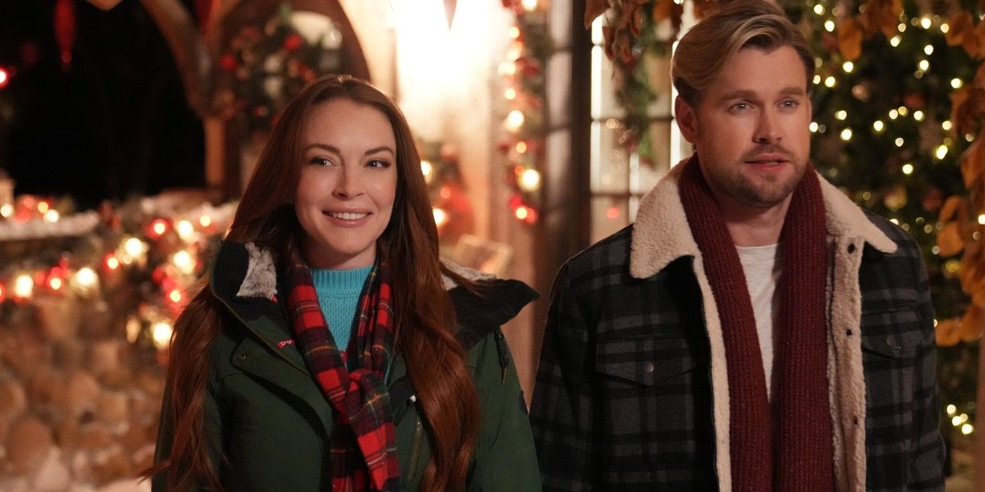 Sierra and Jake smile and walk side by side in Falling for Christmas