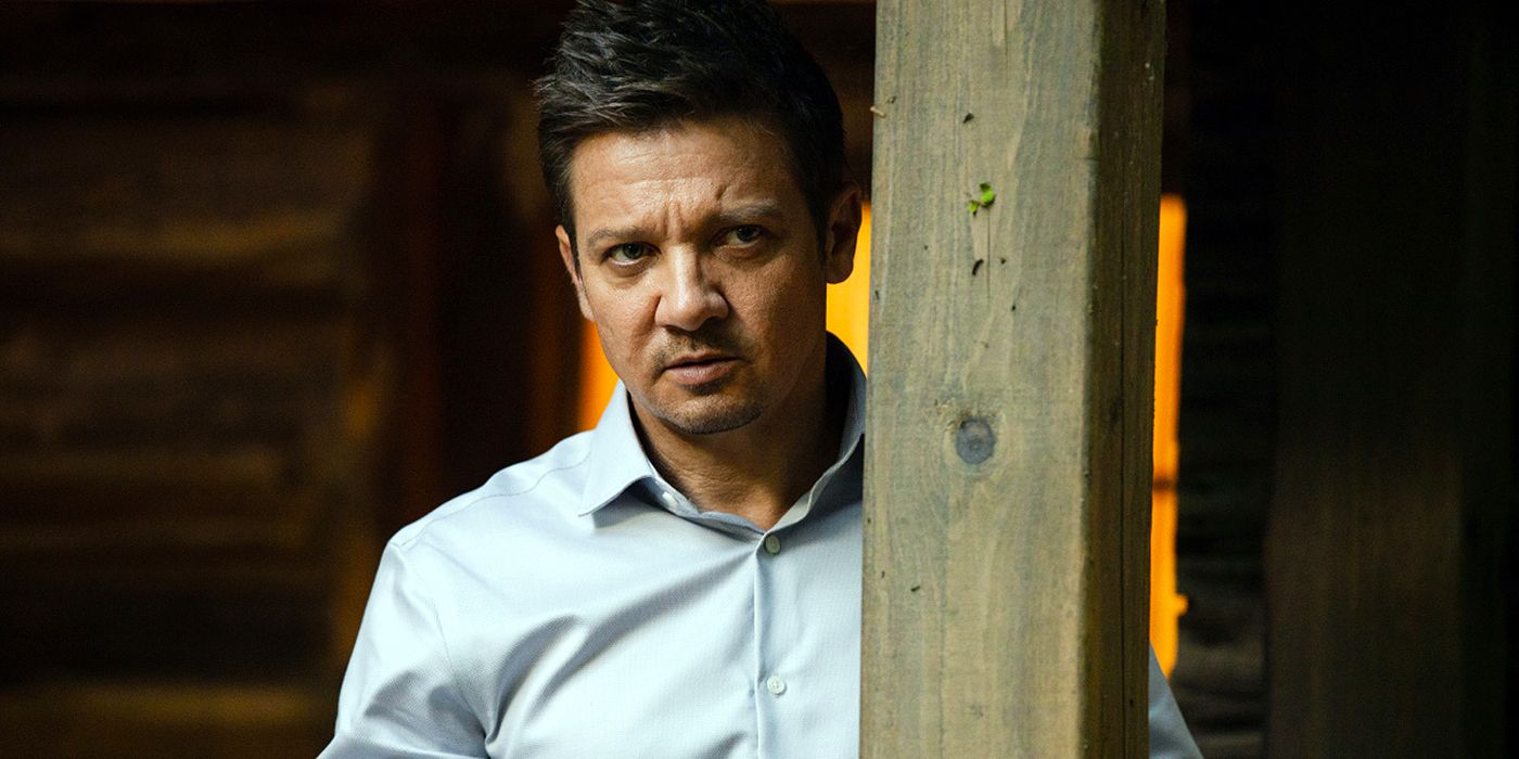 Jeremy Renner's Mike stands behind a beam in Mayor of Kingstown