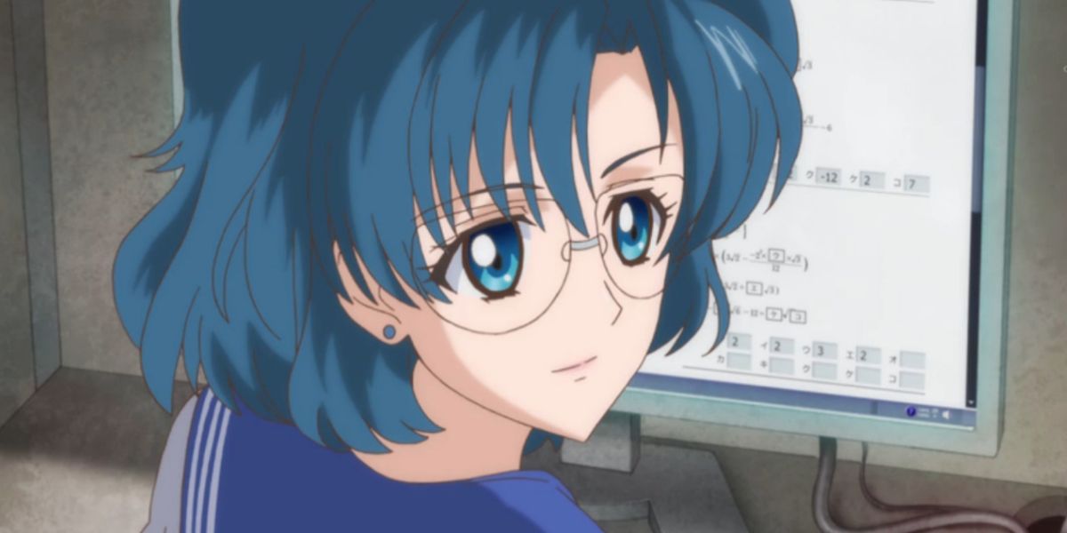 Ami Mizuno wearing glasses in front of a computer in Sailor Moon.