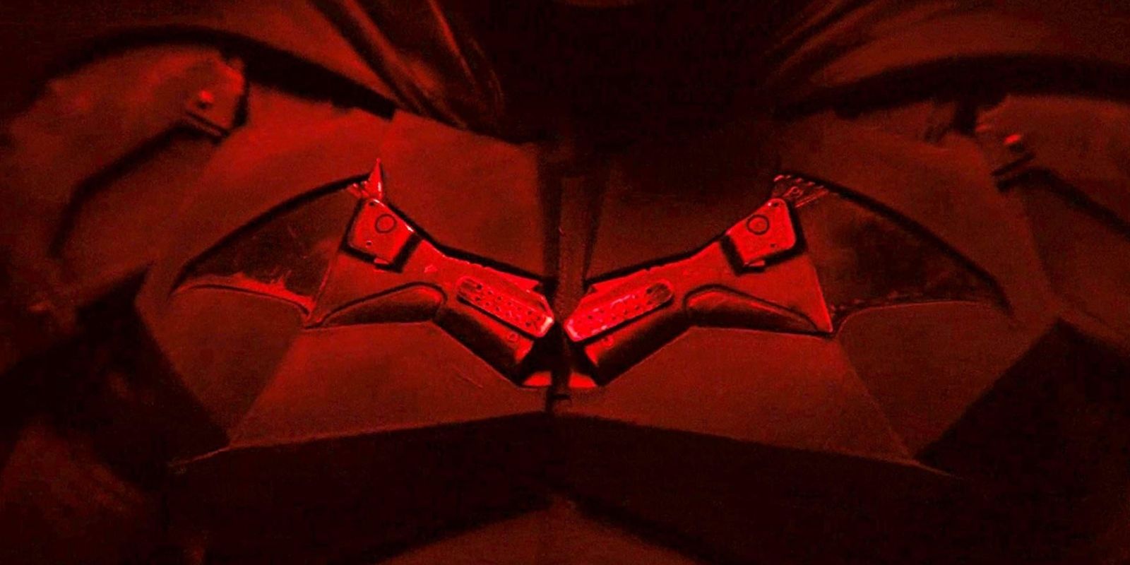 Batman's symbol, lit up in red