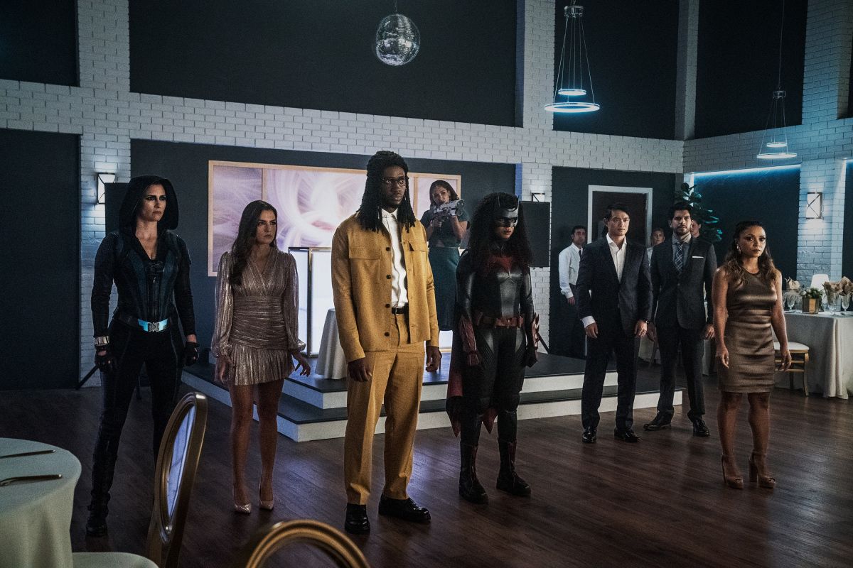 The Flash -- &quot;Armageddon, Part 4&quot; -- Image Number: FLA804a_0401r.jpg -- Pictured (L-R): Chyler Leigh as Sentinel, Kayla Compton as Allegra Garcia, Brandon McKnight as Chester P. Runk, Candice Patton as Iris West-Allen, Javicia Leslie as Ryan Wilder/Batwoman, Osric Chau as Ryan Choi, Andres Soto as Marcus and Danielle Nicolet as Cecile Horton -- Photo: Katie Yu/The CW -- © 2021 The CW Network, LLC. All Rights Reserved