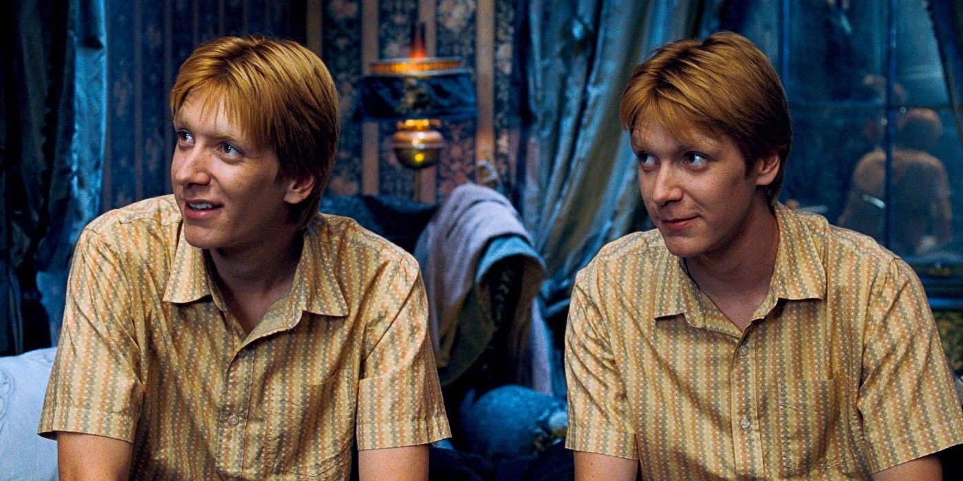 Fred and George Weasley sitting together in the Gryffindor Common Room