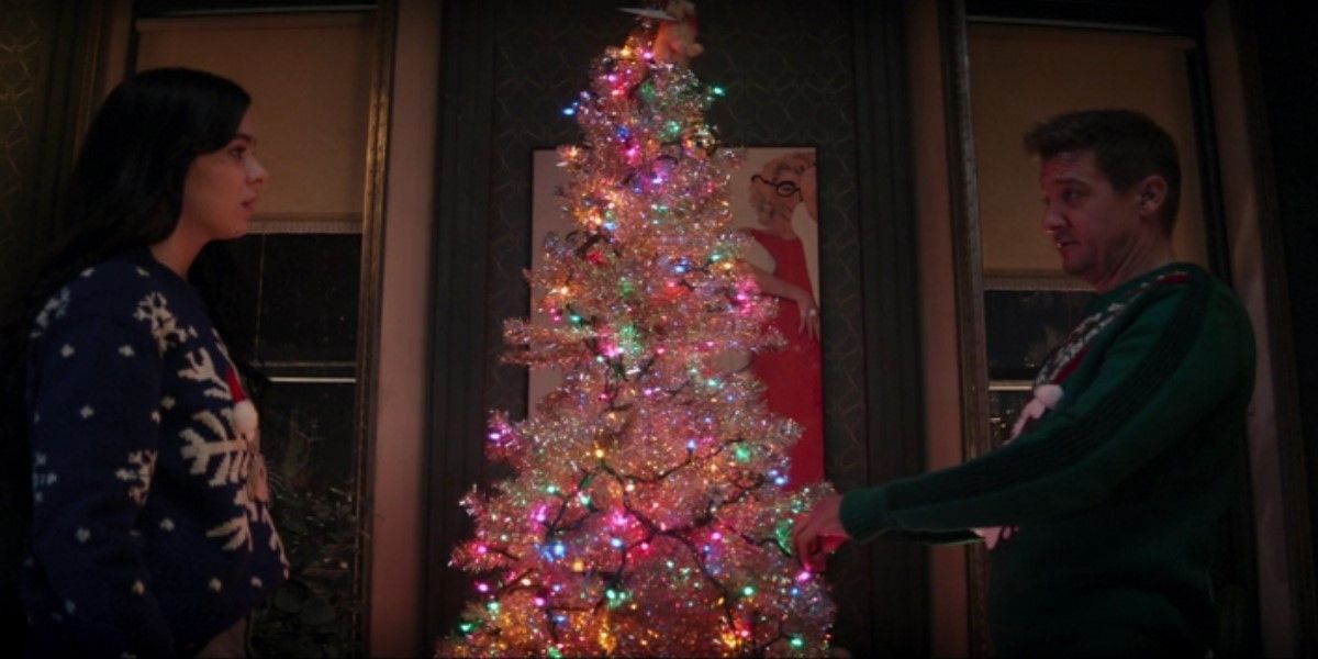 Clint and Kate appreciate a Christmas tree in Hawkeye