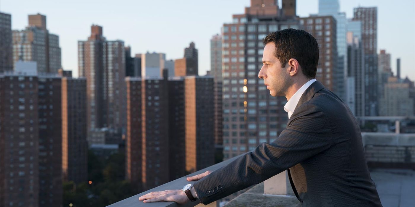 Kendall Roy looks out upon New York City.