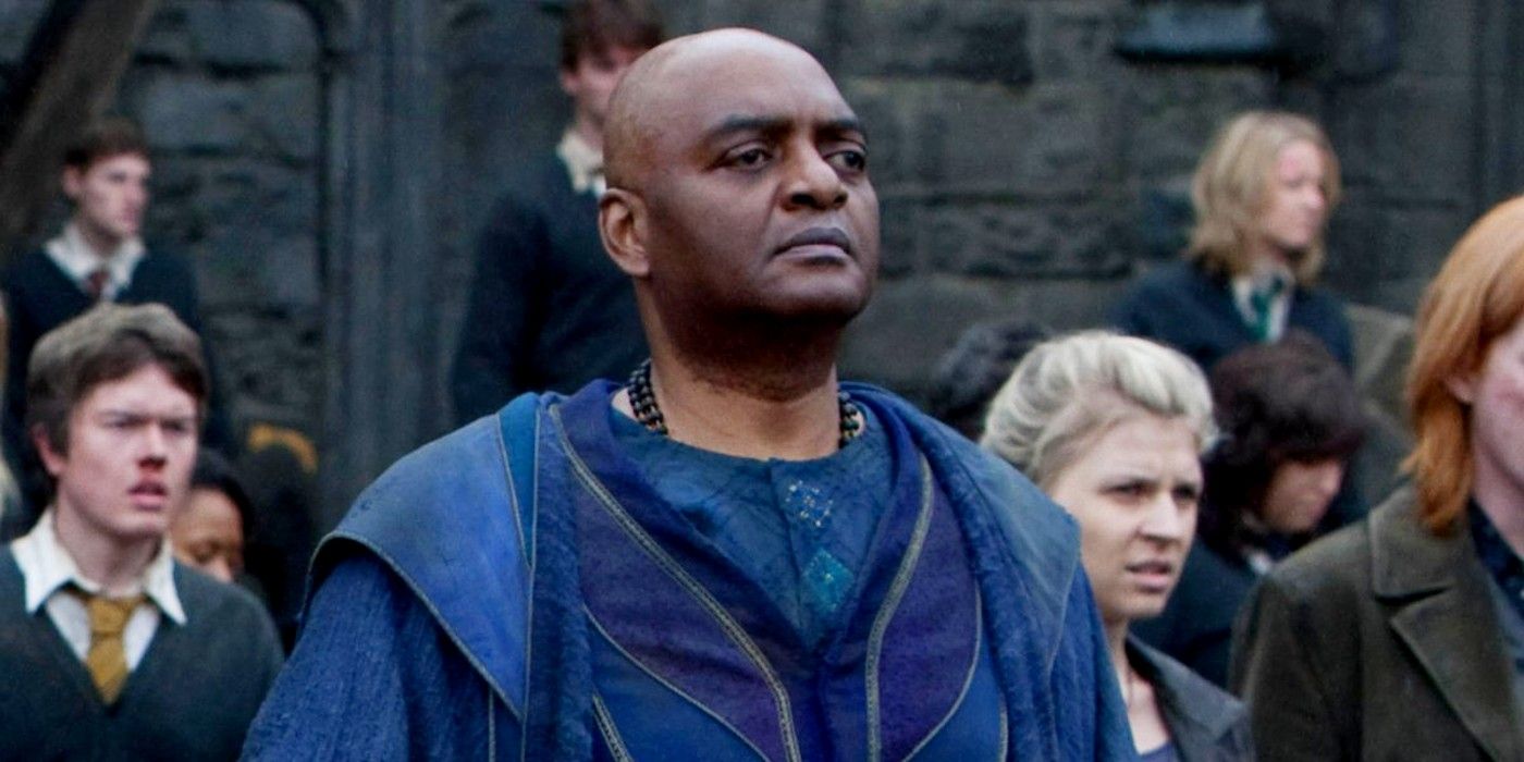 Kingsley Shacklebolt at Hogwarts with students in the background
