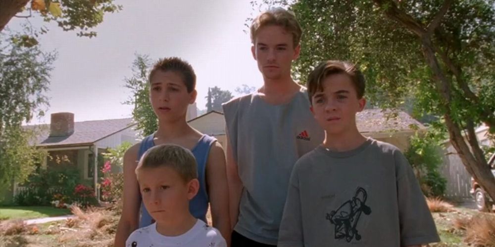 Dewey, Malcolm, Reese and Francis have disappointed expressions while outdoors in Malcolm in the Middle
