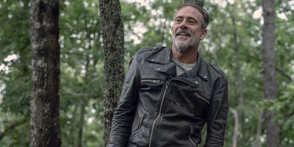 Negan swaggering outside Alexandra with his leather jacket The Walking Dead