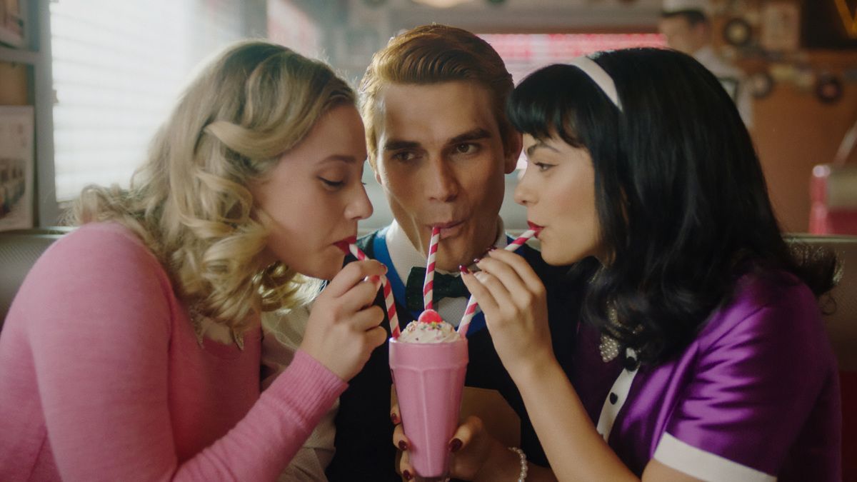 Riverdale -- &quot;Chapter One Hundred: The Jughead Paradox&quot; -- Image Number: RVD605fg_0058r.jpg -- Pictured (L-R): Lili Reinhart as Betty Cooper, KJ Apa as Archie Andrews and Camila Mendes as Veronica Lodge -- Photo: The CW -- © 2021 The CW Network, LLC. All Rights Reserved.