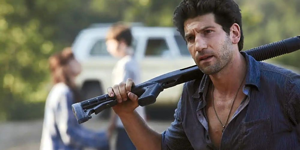 Shane shouldering a shotgun in the Walking Dead TV show