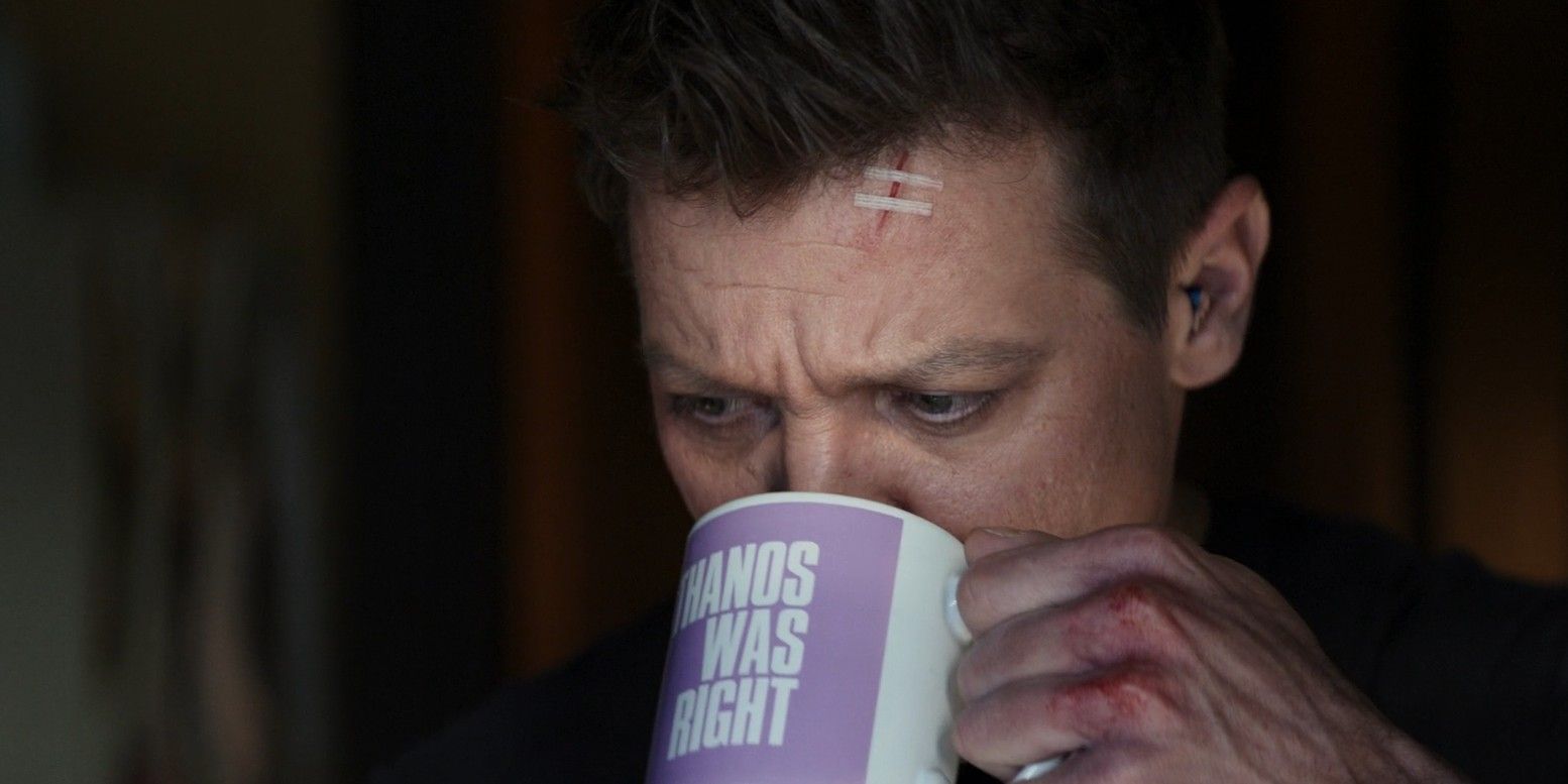 Hawkeye drinks from a mug that says Thanos was right