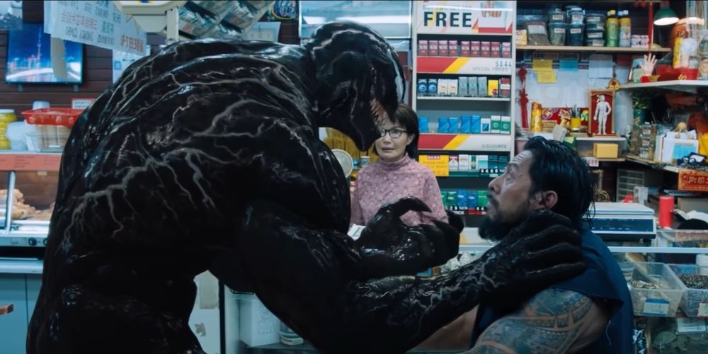 Venom threatens a robber in a corner store Venom movie