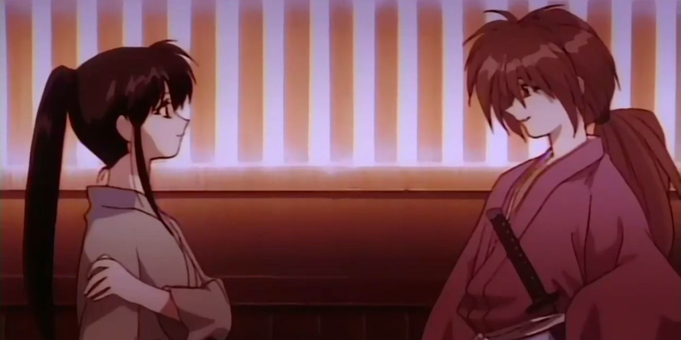 Kenshin and Kaoru from Rurouni Kenshin staring at each other