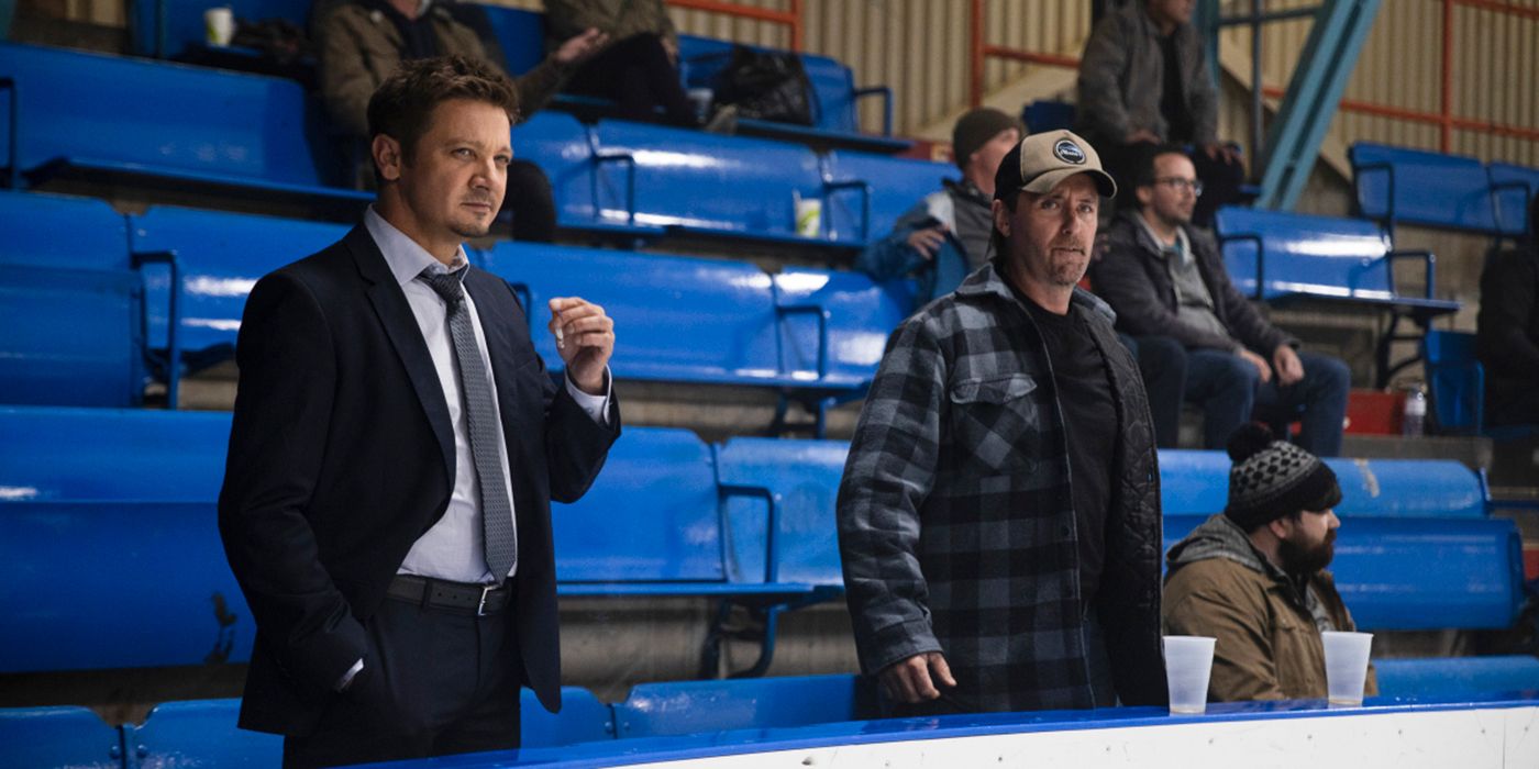 Mike (Jeremy Renner) and a hockey player's dad at a game in Mayor of Kingstown