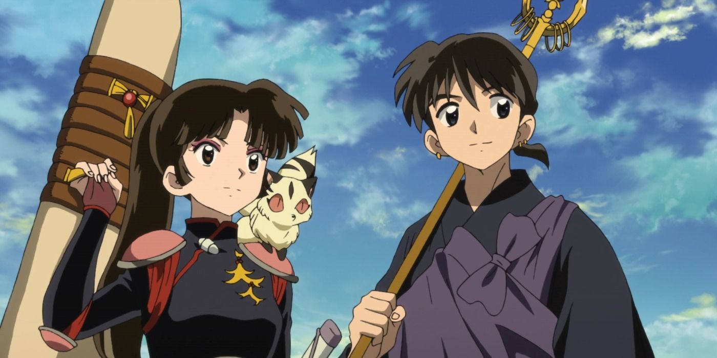 Sango and Miroku from Inuyasha standing next to each other