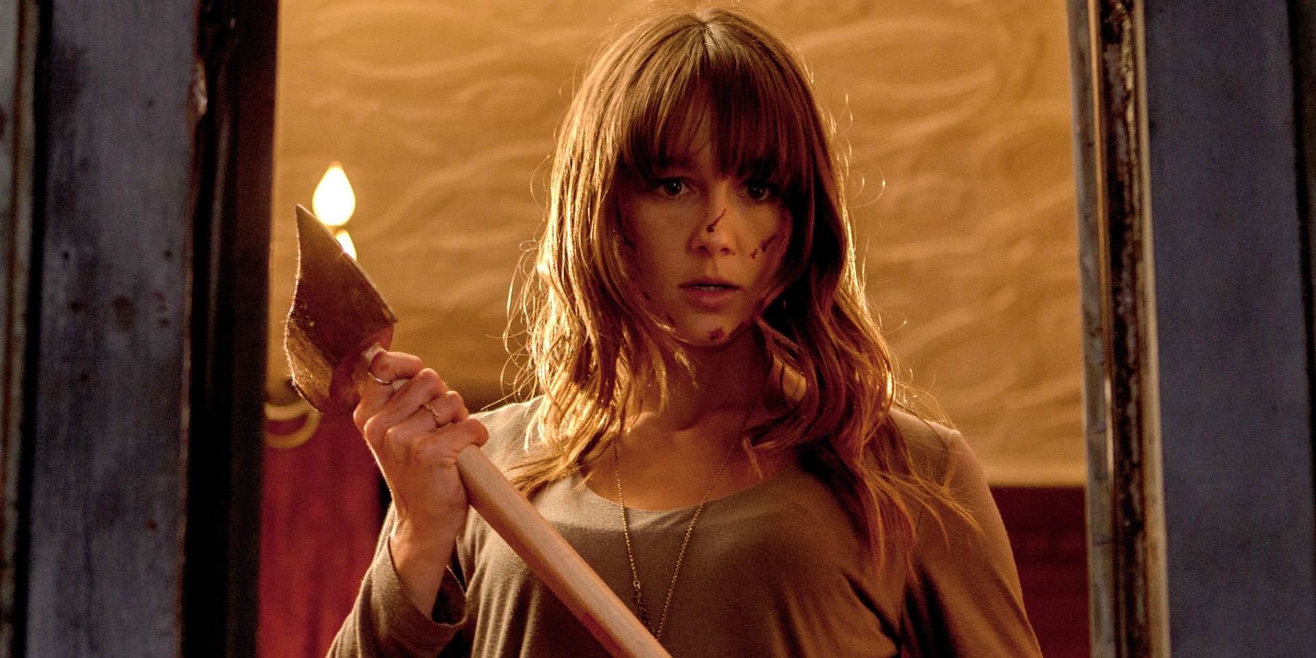 Erin holds an axe in You're Next