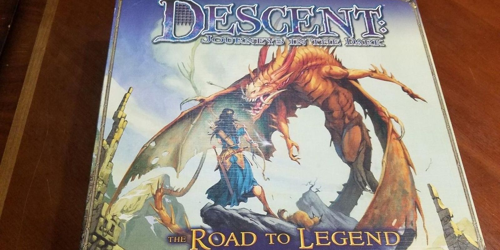 Descent The Road To Legend Board Game Expansion Box On Table