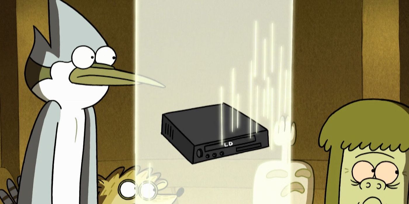 Mordecai and Rigby watch the laserdisc player