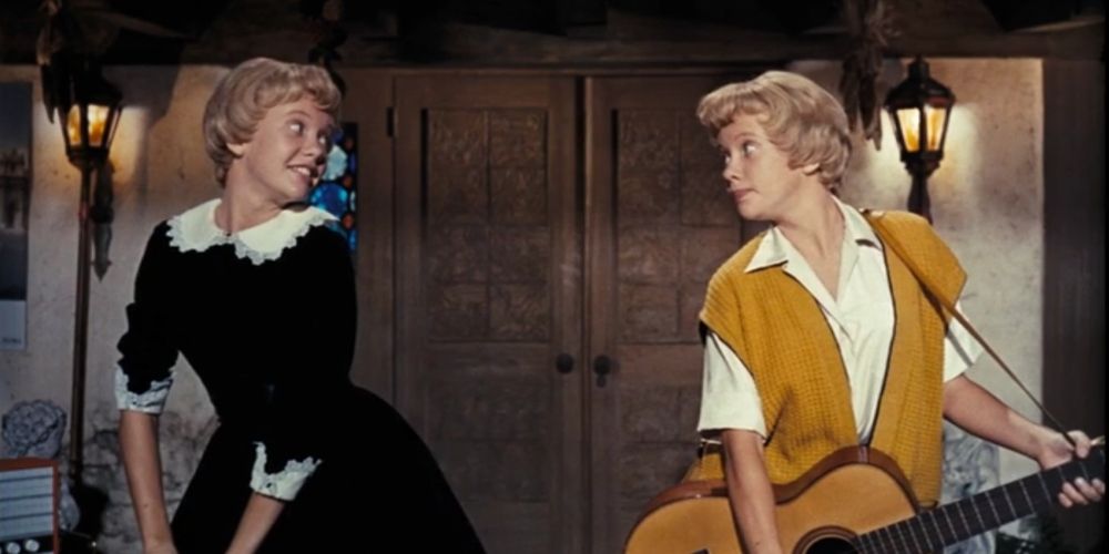 Hayley Mills performing alongside herself to sing 'Let's Get Together' in the Parent Trap 1961 movie