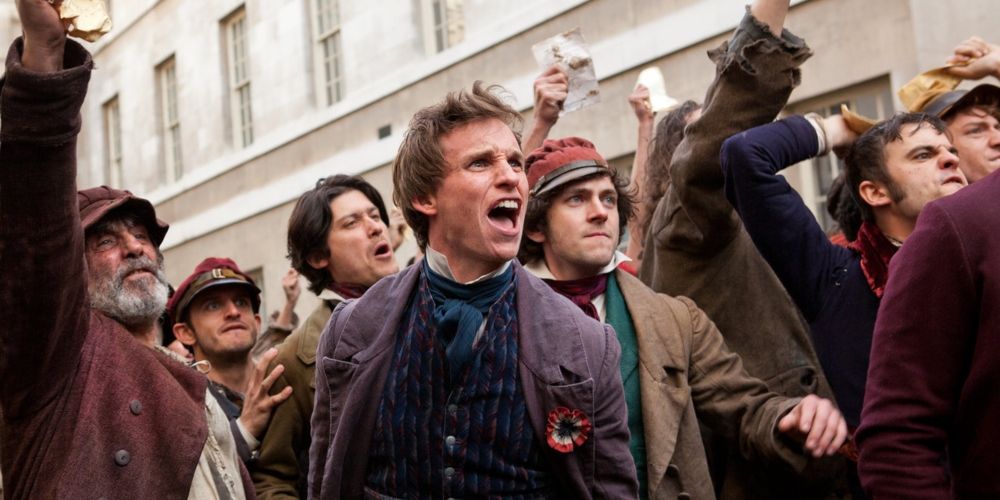 Marius and Les amis de ABC lead the rebellion in Les Miserabless movie