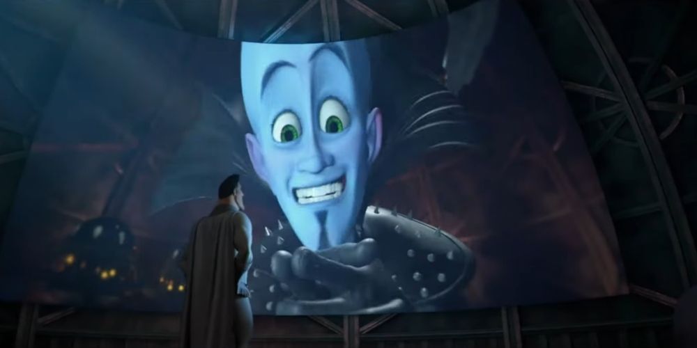Megamind and Metro Man argue through a screen in Megamind movie 