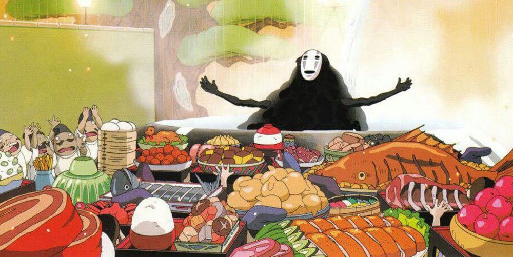 No-Face Spreads their arms over a table full of food