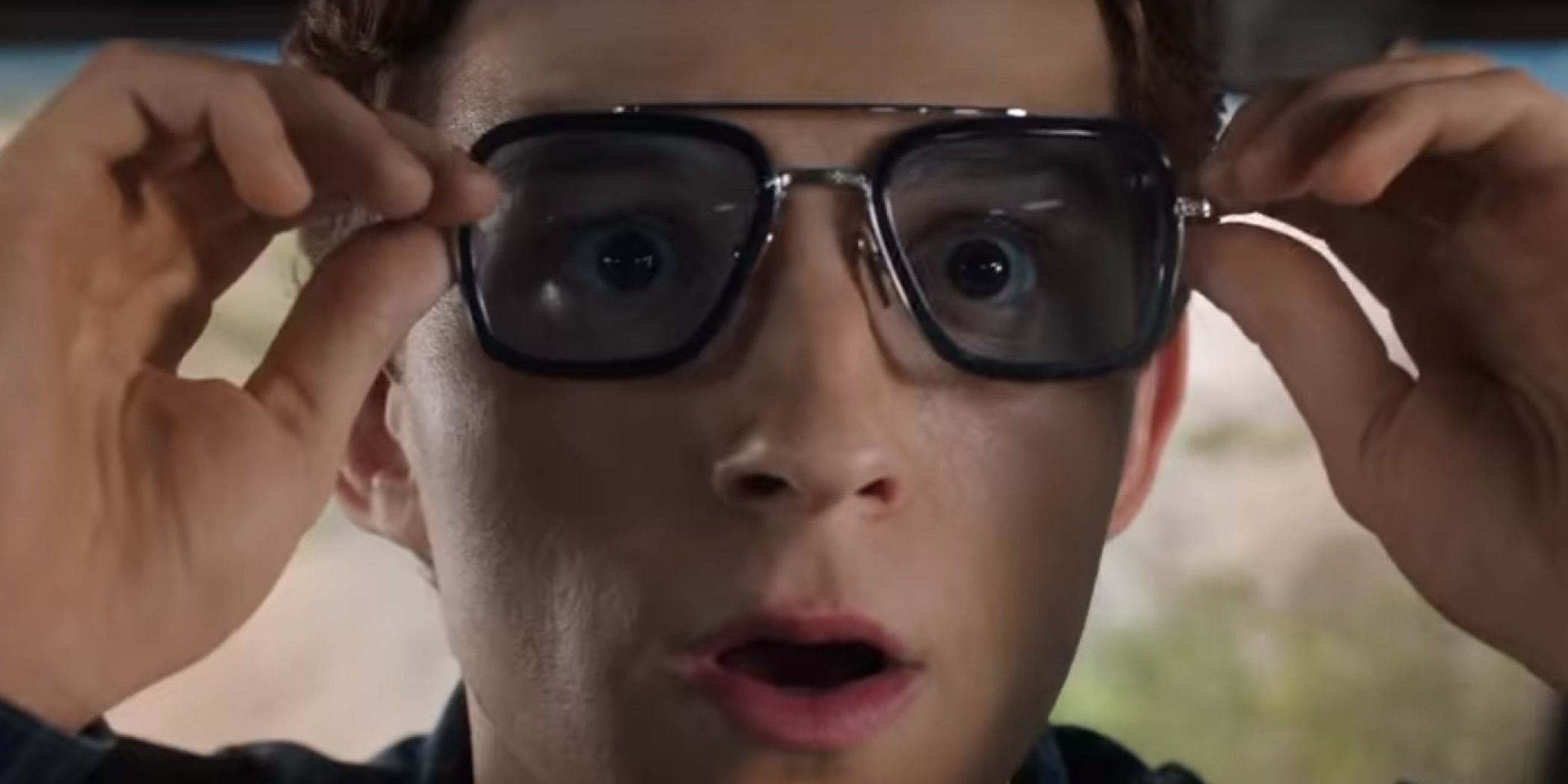 Peter Parker Putting On Tony Stark's Glasses