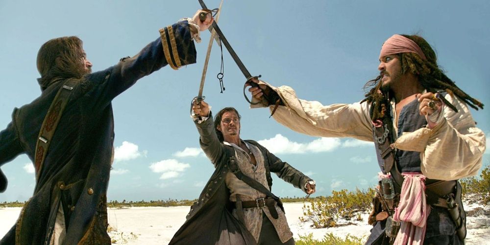 Jack Sparrow, Will Turner, and James Norrington battle over the key to the Dead Man's Chest Pirates of the Caribbean