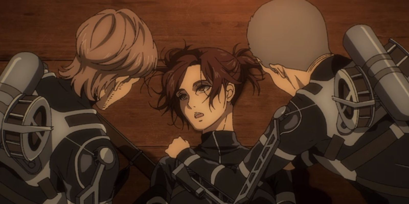 Jean and Connie checking up on Sasha after she was shot by Gabi Braun in Attack On Titan.