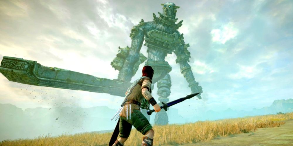 Wander battles a colossus in Shadow of the Colossus game