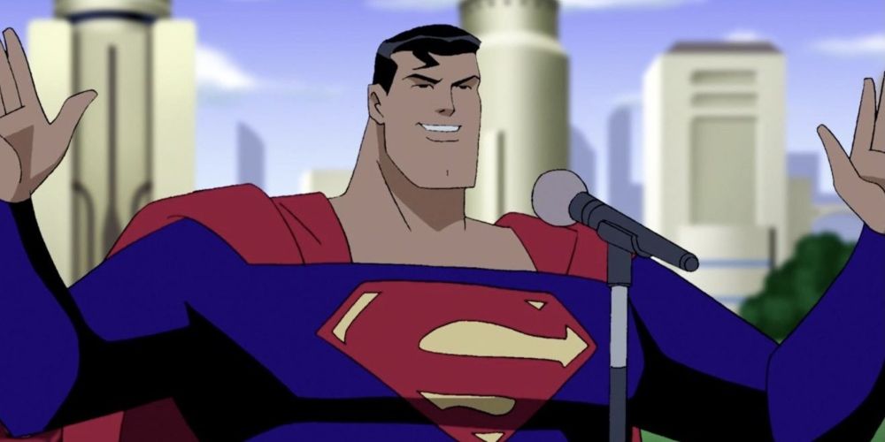 Superman up on a stage in the DCAU