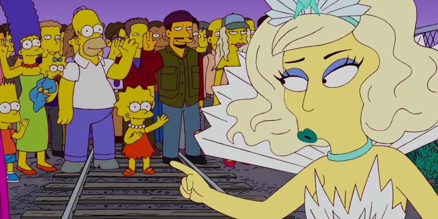 The Simpsons Lady Gaga points at Lisa amongst a Springfield crowd