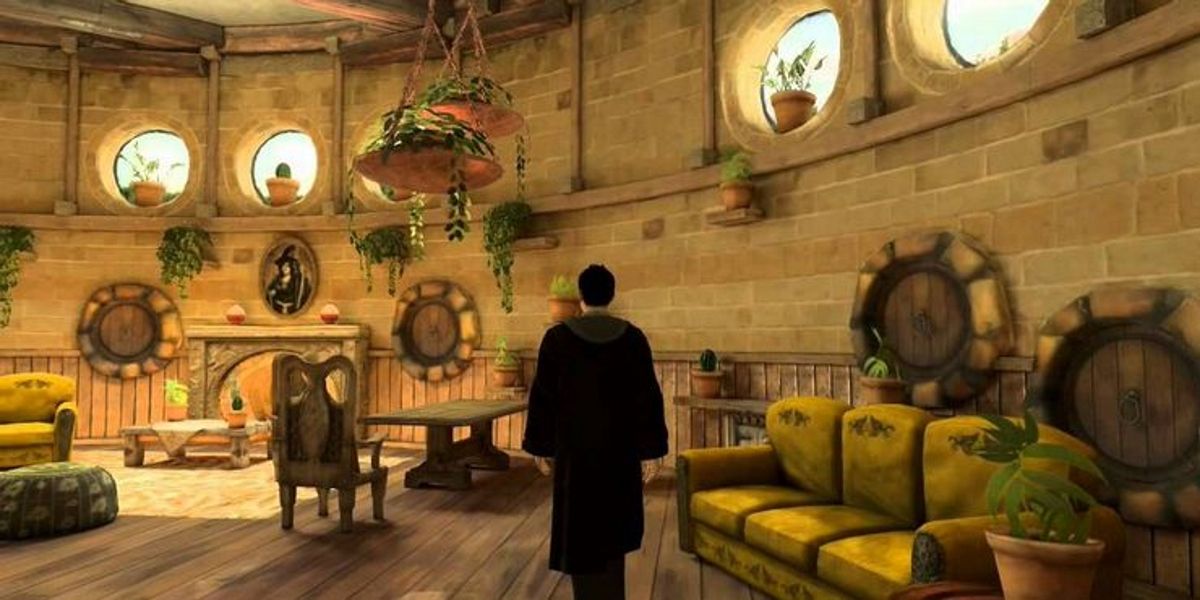 An image of a wizard exploring the Hufflepuff Common Room in Hogwarts Legacy 
