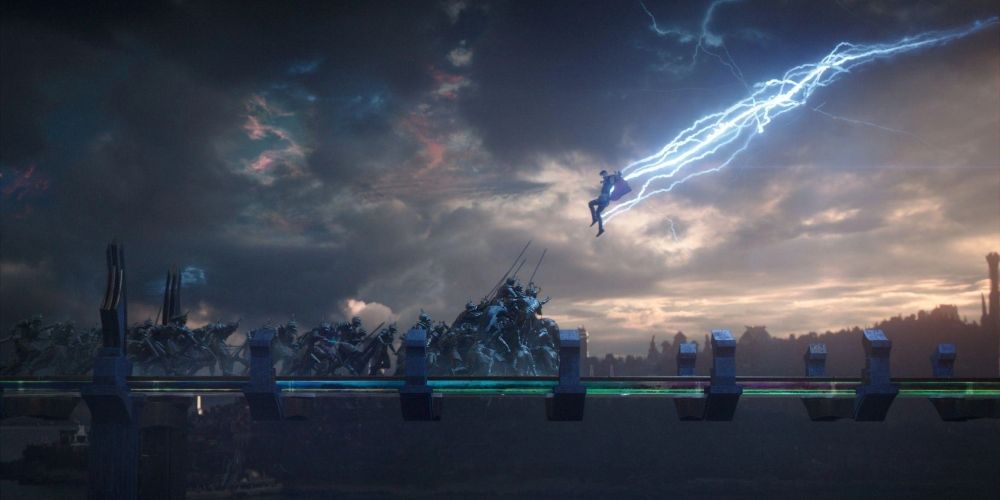 Thor thunders towards a group of Einherjar in Thor: Ragnarok movie