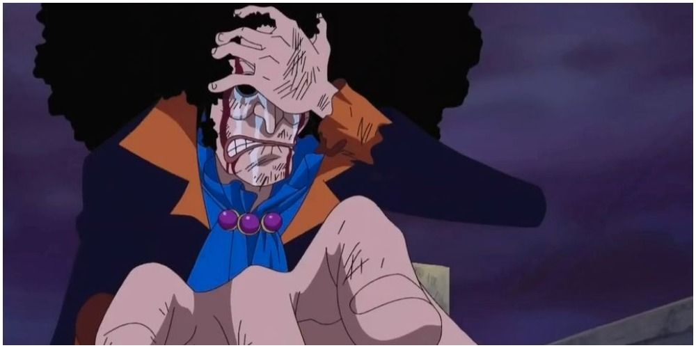 Brook crying with hand on his head