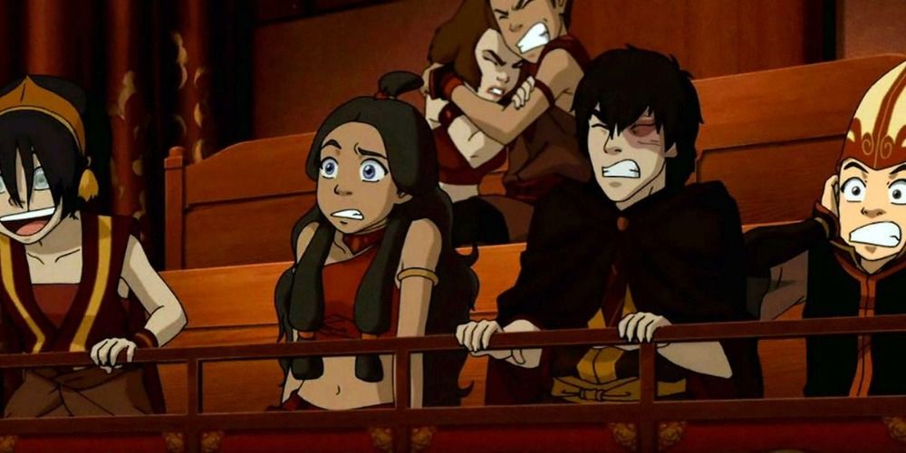 Toph laughing while the rest of the gang cringing in theatre seats