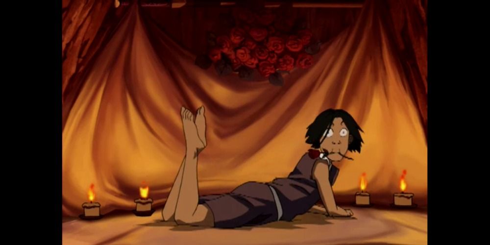 Sokka lying in a tent with flower in mouth