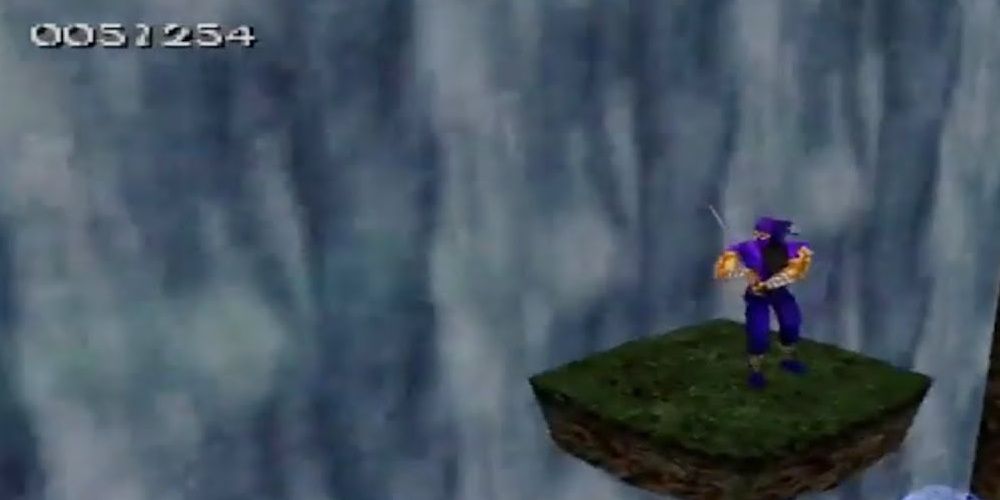 A Ninja stands by a waterfall
