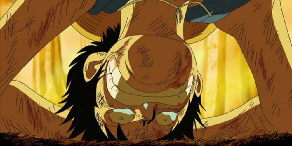 Luffy crying with head on the floor looking beaten 