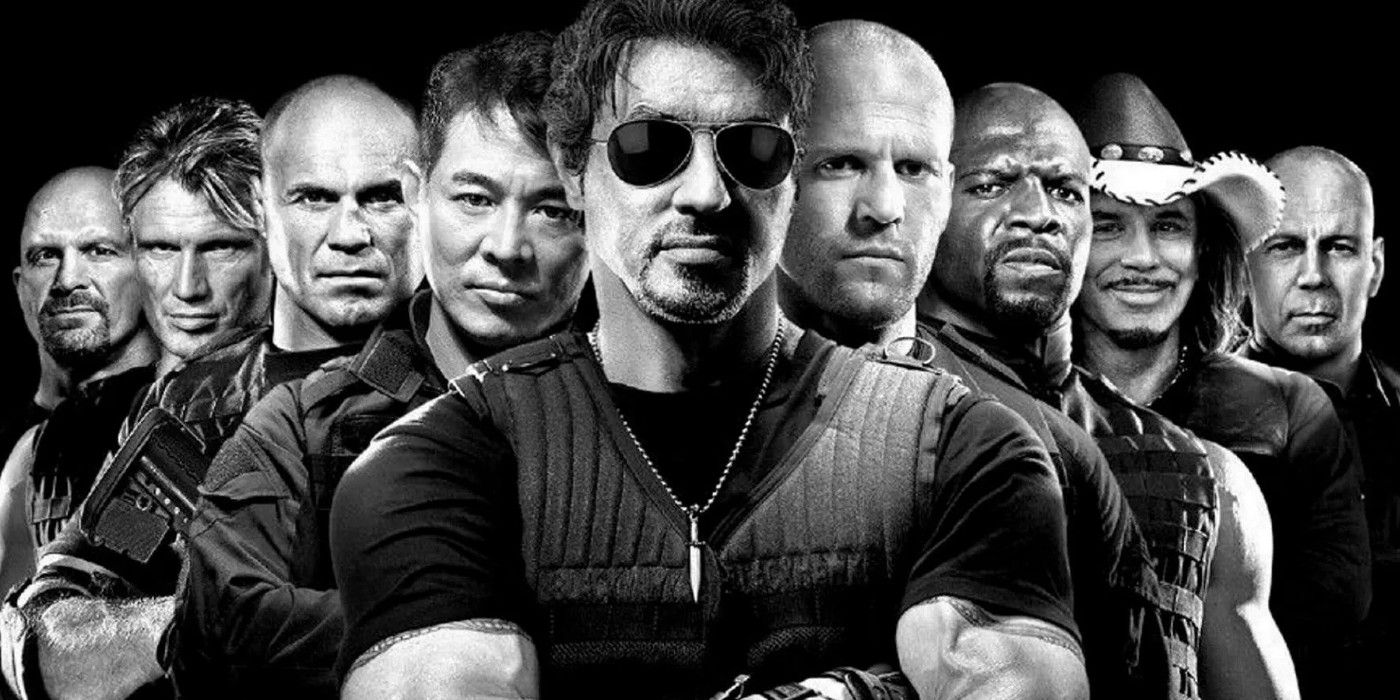 The cast of The Expendables with arms crossed