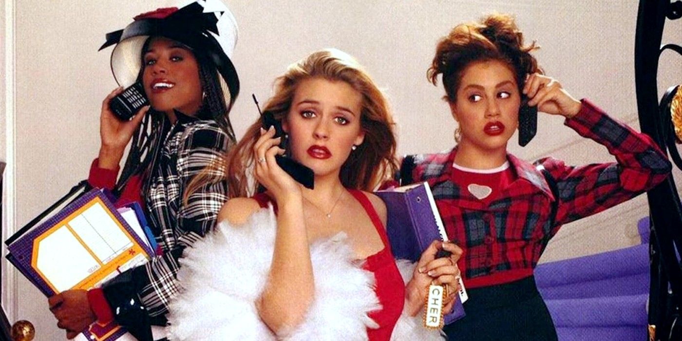 Cher, Dionne and Tai holding cellphones in Clueless