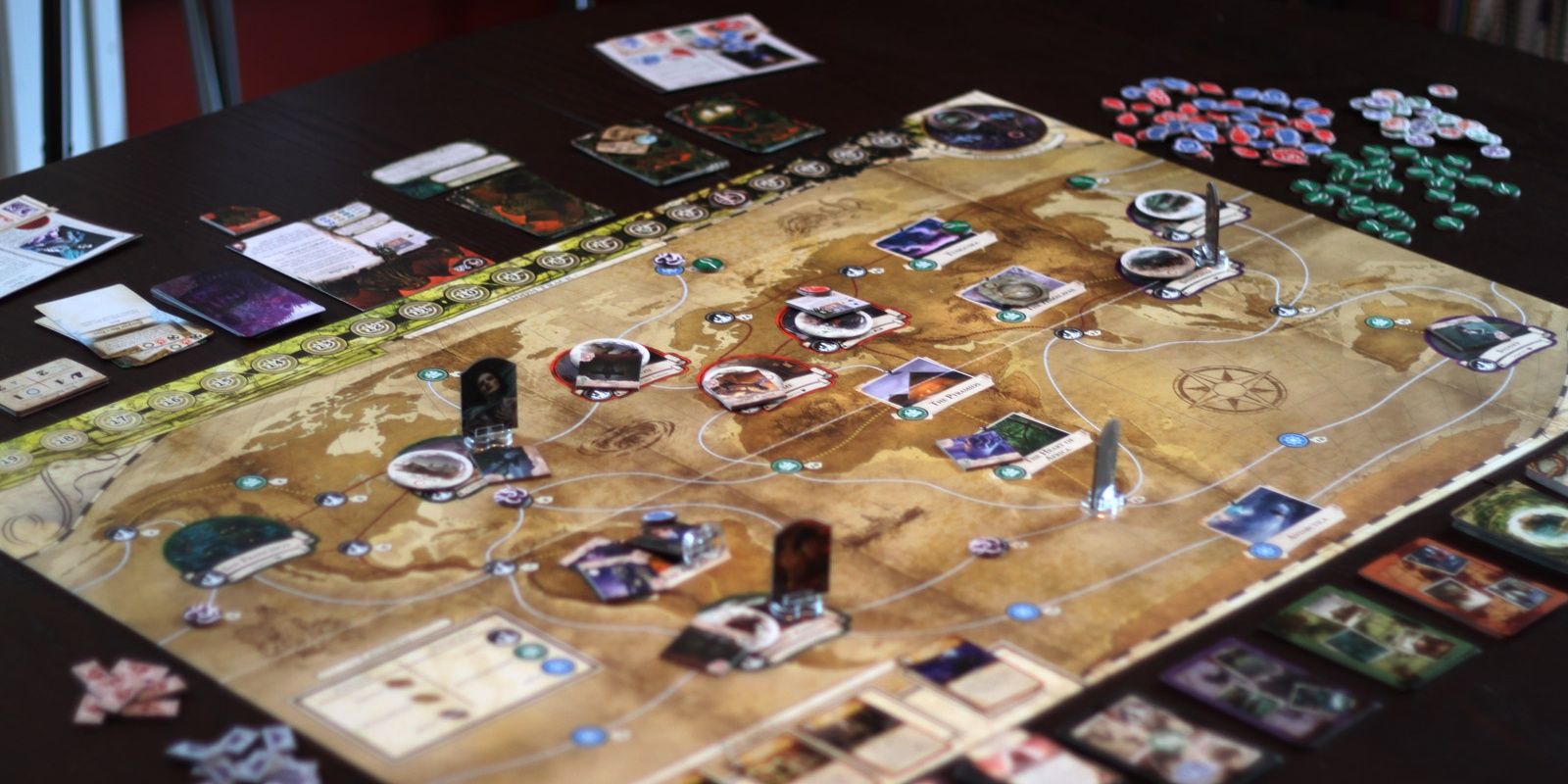 Eldritch Horror Board Game Being Played On The Table